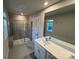 Modern bathroom with a double vanity and a large shower at 284 Laura Elizabeth Ln, Clover, SC 29710