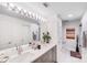 Spacious bathroom with double sinks, a large mirror, and modern finishes at 315 Arlington Ave # 607, Charlotte, NC 28203