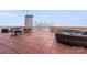 Enjoy the city skyline from this rooftop deck with ample seating and gathering spots at 315 Arlington Ave # 607, Charlotte, NC 28203