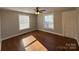 Spacious bedroom with hardwood floors and large windows at 330 E Main St, Albemarle, NC 28001