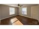 Spacious bedroom with hardwood floors and natural lighting at 330 E Main St, Albemarle, NC 28001