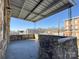 Charming stone covered porch offering views of city and stone railing at 330 E Main St, Albemarle, NC 28001