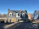 Stone house with gray roof and small porch at 330 E Main St, Albemarle, NC 28001