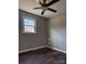 Bright bedroom with hardwood floors and ceiling fan at 3730 Sedgefield Dr, Conover, NC 28613