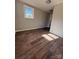 Spacious spare bedroom with vinyl flooring and a large window at 3730 Sedgefield Dr, Conover, NC 28613