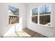 Well-lit bedroom with large windows and hardwood floors at 3739 Kennedy Rd, Gastonia, NC 28056