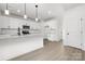 Modern kitchen with white cabinets, granite countertops, and stainless steel appliances at 3739 Kennedy Rd, Gastonia, NC 28056