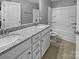 Shared bathroom with double vanity and granite countertop at 3758 Yorkshire Pl, Terrell, NC 28682