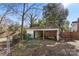 Outbuilding and carport in a fenced backyard at 413 W 5Th Ave, Gastonia, NC 28052