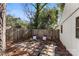 Stone patio space with two chairs and a privacy fence at 413 W 5Th Ave, Gastonia, NC 28052