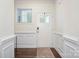 Light and airy foyer with wainscoting and hardwood flooring at 4134 Steel Way, Sherrills Ford, NC 28673