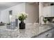 Granite kitchen island with decorative accents and seating at 4134 Steel Way, Sherrills Ford, NC 28673