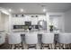 Modern kitchen with white cabinets, granite island, and stainless steel appliances at 4134 Steel Way, Sherrills Ford, NC 28673