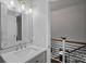 Bathroom featuring a vanity with a mirror and lighting, next to the upstairs hallway at 4747 Kenneths Dr, Maiden, NC 28650