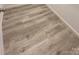 Close up of wood-look flooring and base trim along the edge of wall at 507 E Lackey Farm Rd, Stony Point, NC 28678