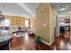 Bright entryway with hardwood floors and view to living room at 5124 Stone Park Dr, Charlotte, NC 28269