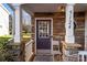 House entrance with stone accents and a purple door at 5124 Stone Park Dr, Charlotte, NC 28269