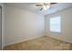 Spacious bedroom with ceiling fan and neutral carpeting at 6340 Revolutionary Trl, Charlotte, NC 28217