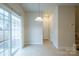 Bright dining area with sliding glass doors and tile floors at 6340 Revolutionary Trl, Charlotte, NC 28217