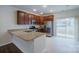 Modern kitchen with granite countertops and stainless steel appliances at 6340 Revolutionary Trl, Charlotte, NC 28217