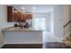 Modern kitchen with granite countertops and stainless steel appliances at 6340 Revolutionary Trl, Charlotte, NC 28217