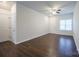 Bright living room featuring hardwood floors and neutral walls at 6340 Revolutionary Trl, Charlotte, NC 28217