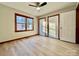 Bright bedroom with double closets and wood-look flooring at 69 Saint Charles Ct, Hickory, NC 28601