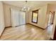 Dining room features wood-look floors and sliding glass doors to deck at 69 Saint Charles Ct, Hickory, NC 28601