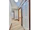 Light and airy hallway with wood-look flooring at 69 Saint Charles Ct, Hickory, NC 28601