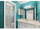 Bathroom features a glass enclosed shower, a toilet and a vanity with drawers at 709 Falls Church Rd, Charlotte, NC 28270