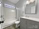 Clean bathroom with shower/tub combo and vanity at 7129 Spandril Ln, Charlotte, NC 28215