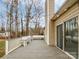 Spacious deck with white railings and string lights at 7129 Spandril Ln, Charlotte, NC 28215