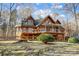 Rustic log home nestled in woods with wrap-around deck at 7404 Mockingbird Ln # 73, Waxhaw, NC 28173