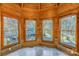 Sunroom with wood walls and multiple windows offering natural light at 7404 Mockingbird Ln # 73, Waxhaw, NC 28173