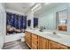 Bathroom with double vanity and walk-in shower at 7871 Petrea Ln, Charlotte, NC 28227