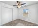 Bedroom with sliding closet doors and a window at 809 Hasty Rd, Marshville, NC 28103