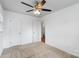 Bedroom with ceiling fan, carpet, and access to hallway at 809 Hasty Rd, Marshville, NC 28103