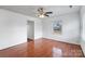 Bright bedroom with hardwood floors and ceiling fan at 809 Hasty Rd, Marshville, NC 28103