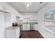 Modern kitchen with white cabinets, granite counters, and stainless steel appliances at 809 Hasty Rd, Marshville, NC 28103