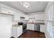 Modern kitchen with white cabinets and granite countertops at 809 Hasty Rd, Marshville, NC 28103