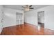 Spacious living room with hardwood floors and built-in shelving at 809 Hasty Rd, Marshville, NC 28103