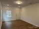 Spacious entryway with hardwood floors and an interior door at 813 Gondola Ct # 107, Salisbury, NC 28144