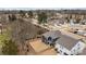 An aerial view of the property showcasing the fenced backyard, the two-story home, and the neighborhood's layout at 8138 Annsborough Nw Dr, Concord, NC 28027