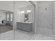 Modern bathroom showcasing a double vanity, walk-in shower, and natural light at 8138 Annsborough Nw Dr, Concord, NC 28027