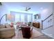 Comfortable living room featuring sectional sofa and hardwood floors at 824 Broad River Ln, Charlotte, NC 28211