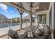 Relaxing screened porch overlooking a refreshing pool at 8904 Clavemorr Glenn Ct, Charlotte, NC 28226