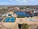 Community features: pool, tennis courts, and lake at 1010 Craven St, Indian Trail, NC 28079