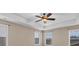 Bright bedroom with neutral walls, ceiling fan, and multiple windows at 1010 Craven St, Indian Trail, NC 28079