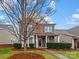 Brick two-story house with front porch and landscaped yard at 1010 Craven St, Indian Trail, NC 28079