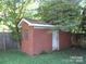 Brick storage shed in the backyard at 1115 Farrior Dr, Charlotte, NC 28215